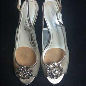 Women's peach metallic caparros sling back heels